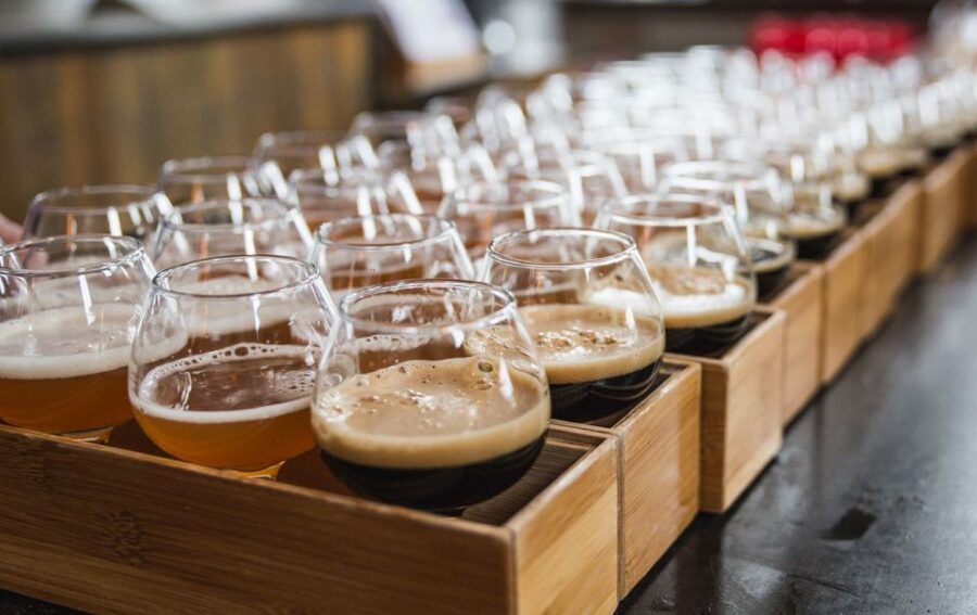 Boston: Guided Craft Brewery Tour with a Snack - Three Boston stops, one easy beer outing