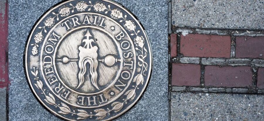 Boston: Historic Pubs Walking & Ferry, Food & Drink Tour - Meeting beneath Modern Pastry in the North End