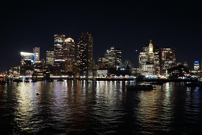 Holiday Sunset Cruise in Boston Harbor - The USS Constitution and the sunset cannon